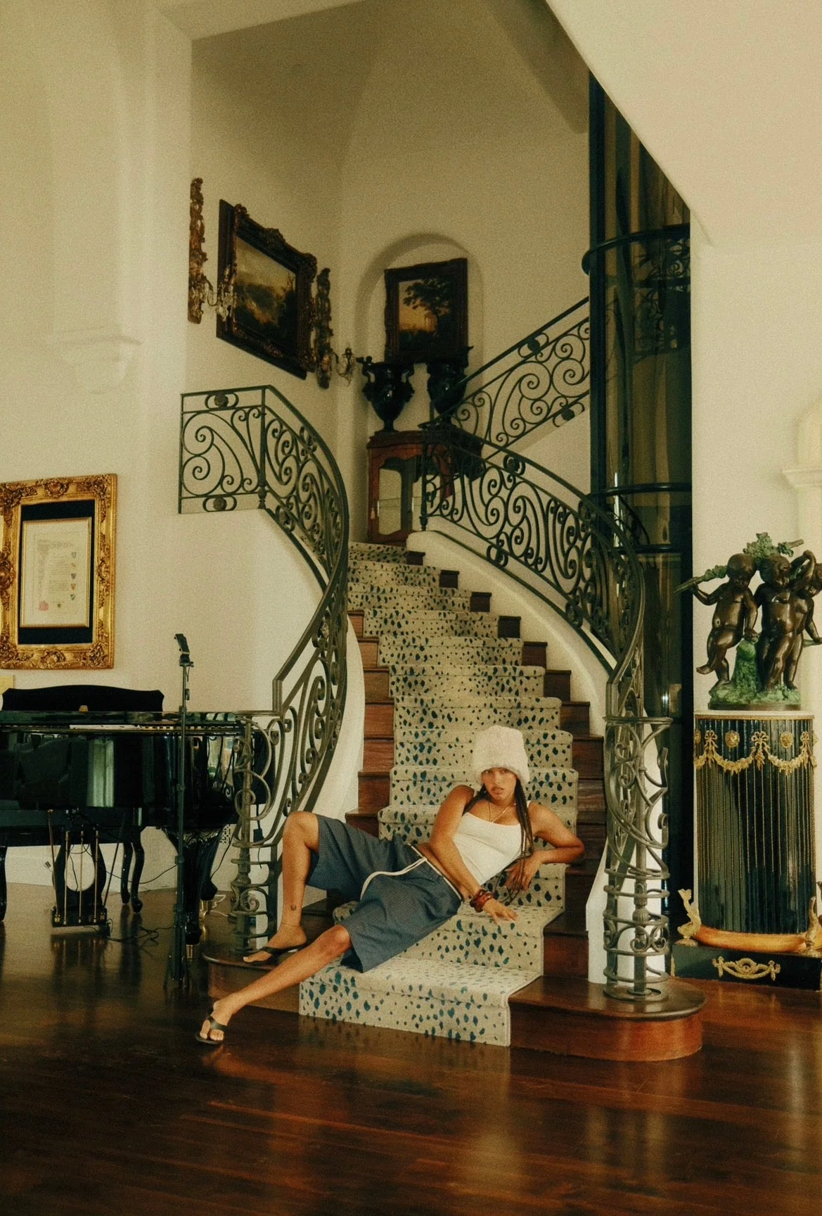 Wide warm interior Cannon Mitchel frame on a curved staircase.