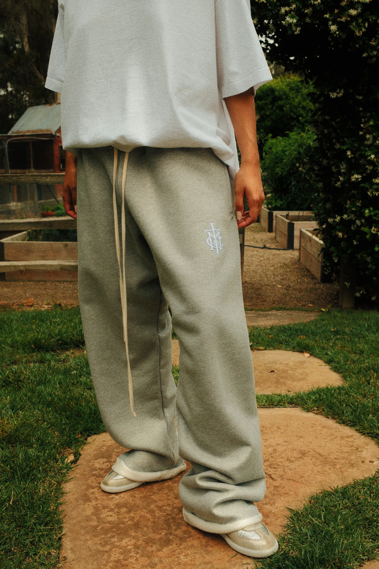 Close view of sterling Cannon Mitchel wide-leg pants and extended drawcord.